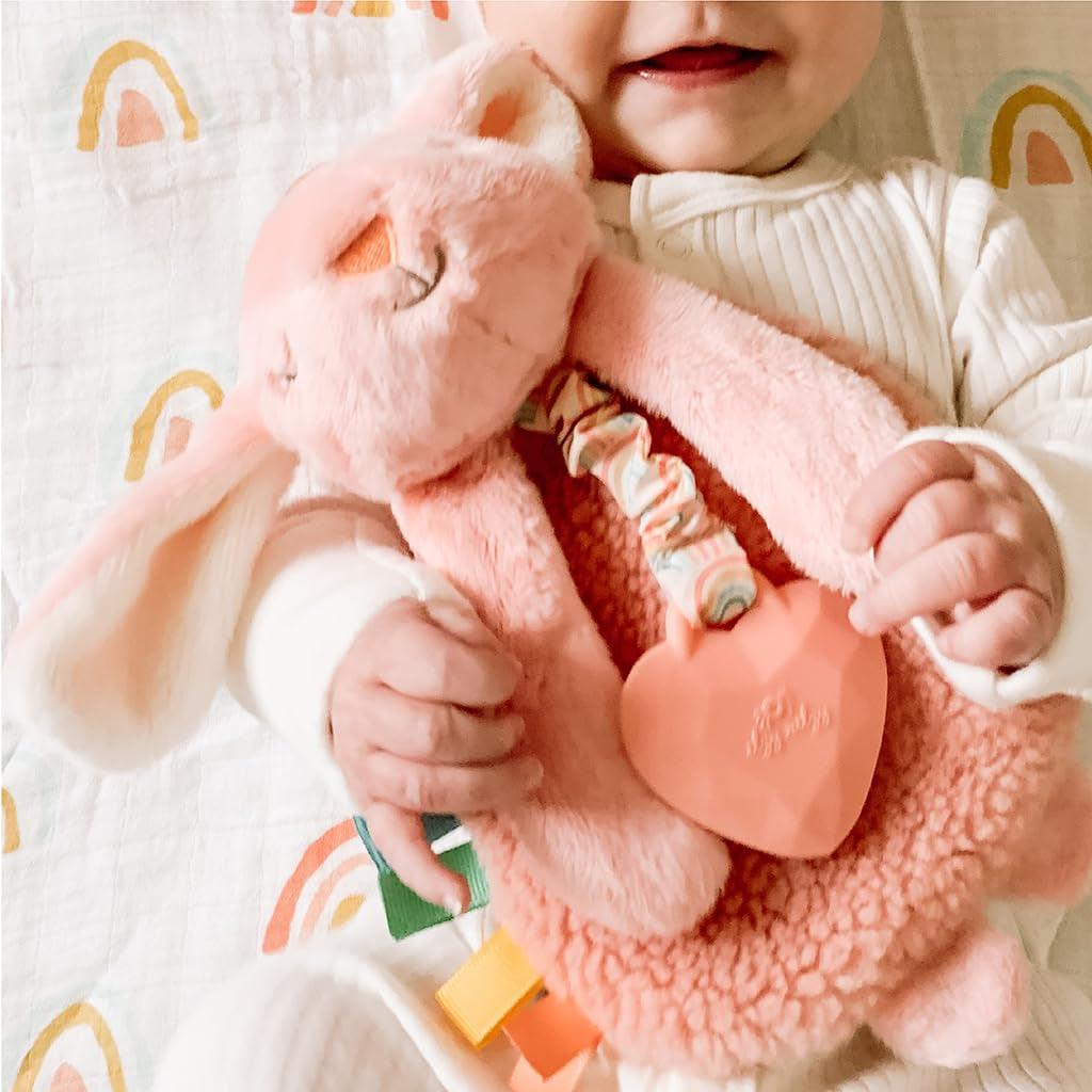 - Itzy Lovey Including Teether - Baby Lovey with Teether, Textured Ribbons & Dangle Arms - Features Crinkle Sound, Sherpa Fabric and Minky Plush (Pink Bunny)